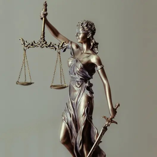 Statue of Lady Justice holding scales