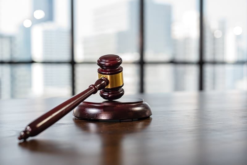 Construction Adjudication: A Complete UK Guide 5 Courtroom and gavel representing TCC enforcement of adjudication decisions