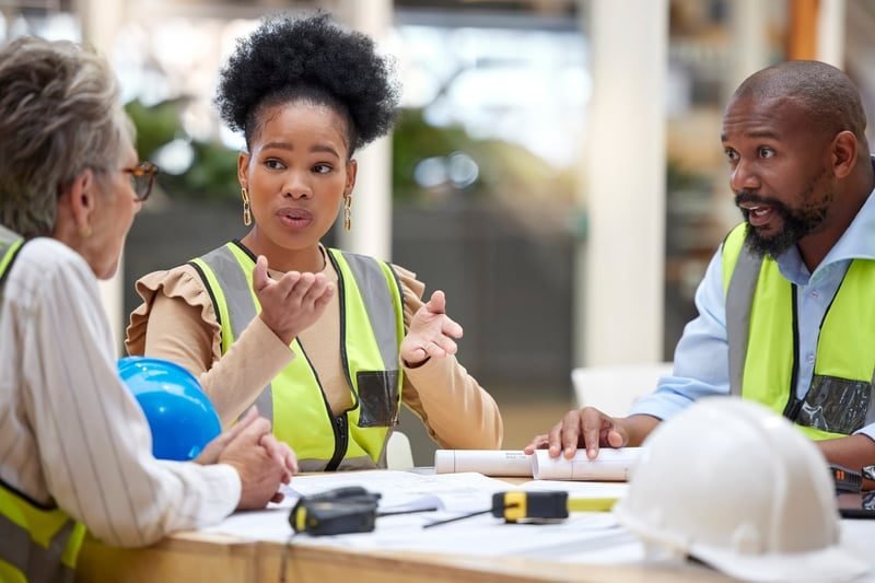 Construction Adjudication: A Complete UK Guide 1 Construction professionals in a site dispute meeting
