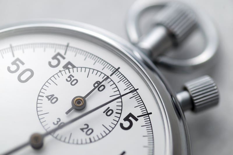 Conciliation: A Complete Guide and How ACAS Works 2 Stopwatch on a desk, illustrating how early conciliation pauses the tribunal time limit