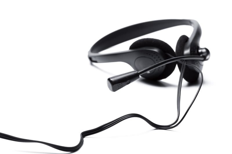 Conciliation: A Complete Guide and How ACAS Works 1 Acas-style conciliator on the phone helping resolve a dispute