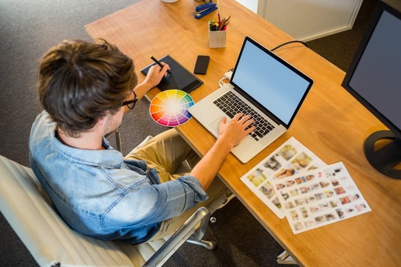 Freelance designer working, illustrating who owns copyright in commissioned work