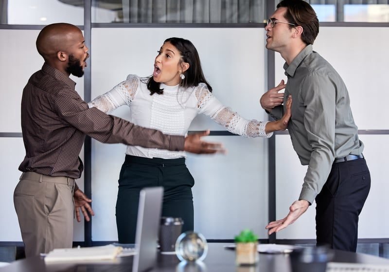 Discrimination Claims: A Complete UK Guide 3 Workplace harassment between colleagues in an office