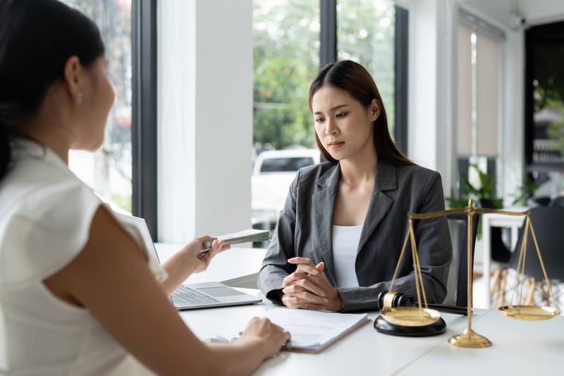 A legal adviser representing a client at an employment tribunal