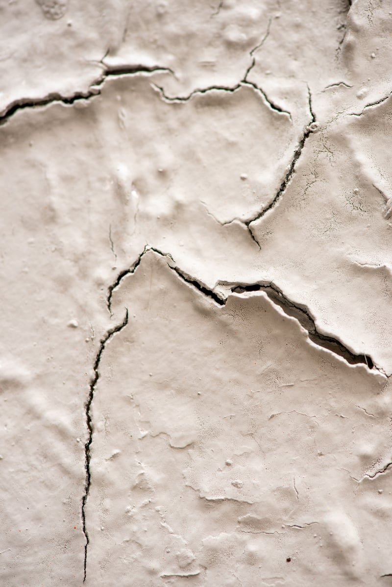 What Is an Environmental Search? A Plain-English Guide for UK Businesses 4 Large crack in a house wall indicating ground stability and subsidence problems