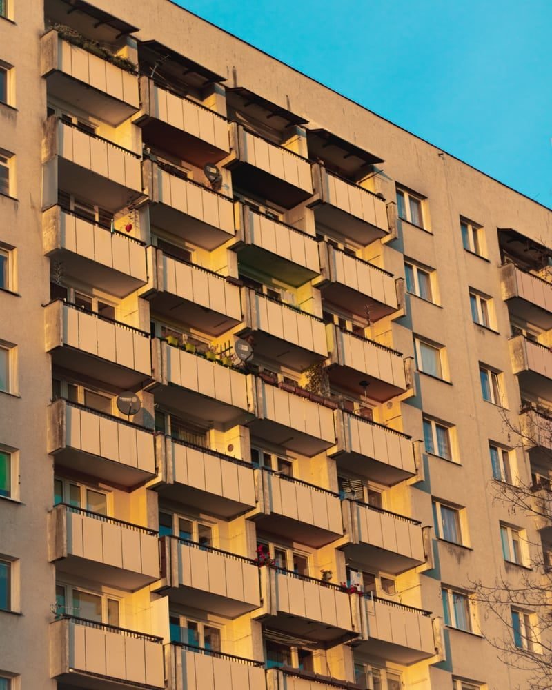 Block of leasehold flats, where owners hold a long lease rather than the freehold