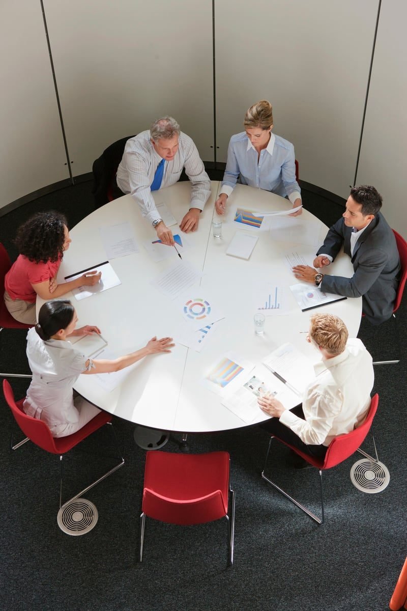 Workplace Mediation: A Complete UK Guide 2 Colleagues in a facilitated round-table discussion