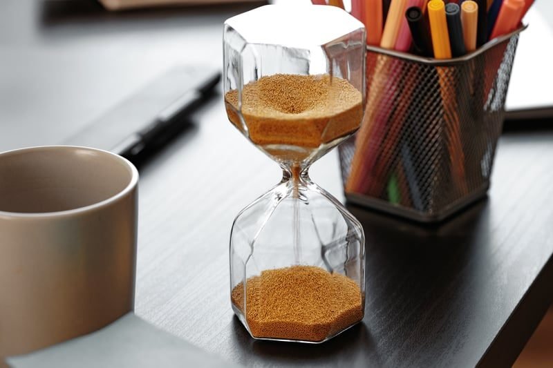 One-Way NDA vs Mutual NDA in London: What Local Businesses Need to Know 4 Hourglass on a desk, representing the duration of NDA confidentiality obligations