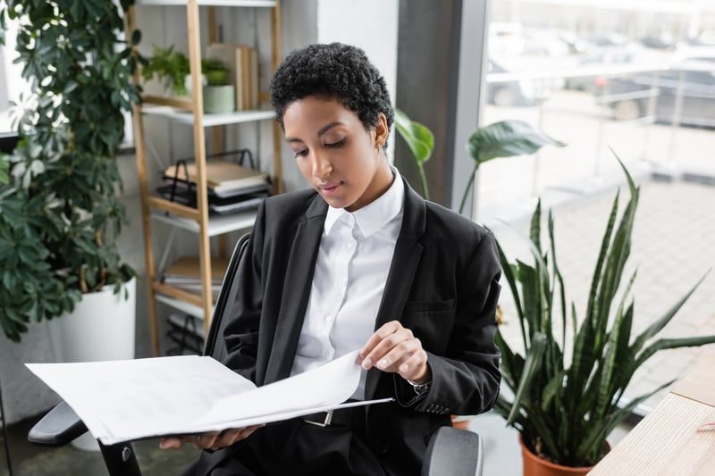 Business Rates for Offices: A Complete UK Guide 4 Manager reviewing documents to reduce an office business rates bill