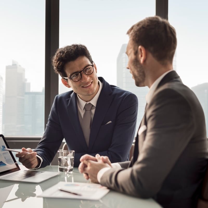 Business adviser meeting a client to discuss reducing business rates