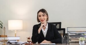 News 1 Professional female solicitor reviewing legal documents in a modern office during an unfair dismissal and redundancy case