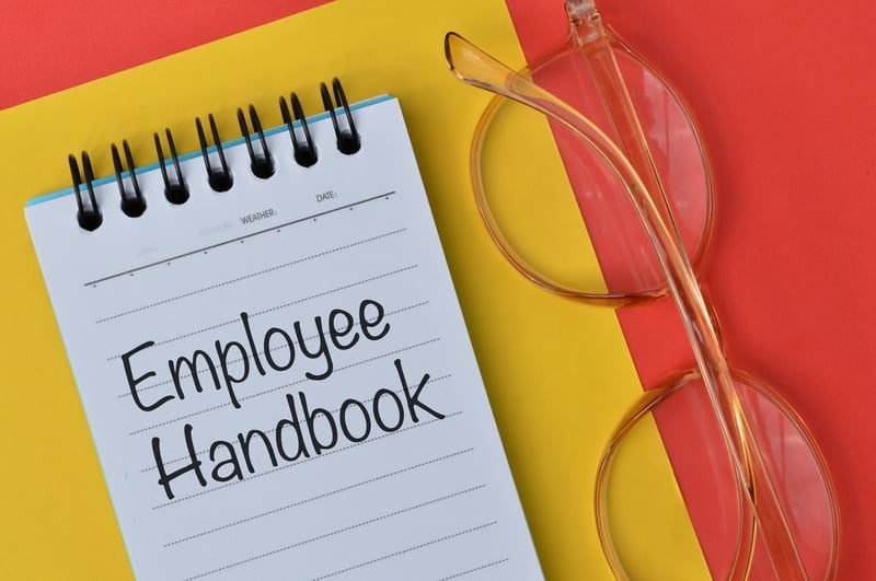 Staff Handbooks: A Complete UK Guide 1 A staff handbook on an office desk