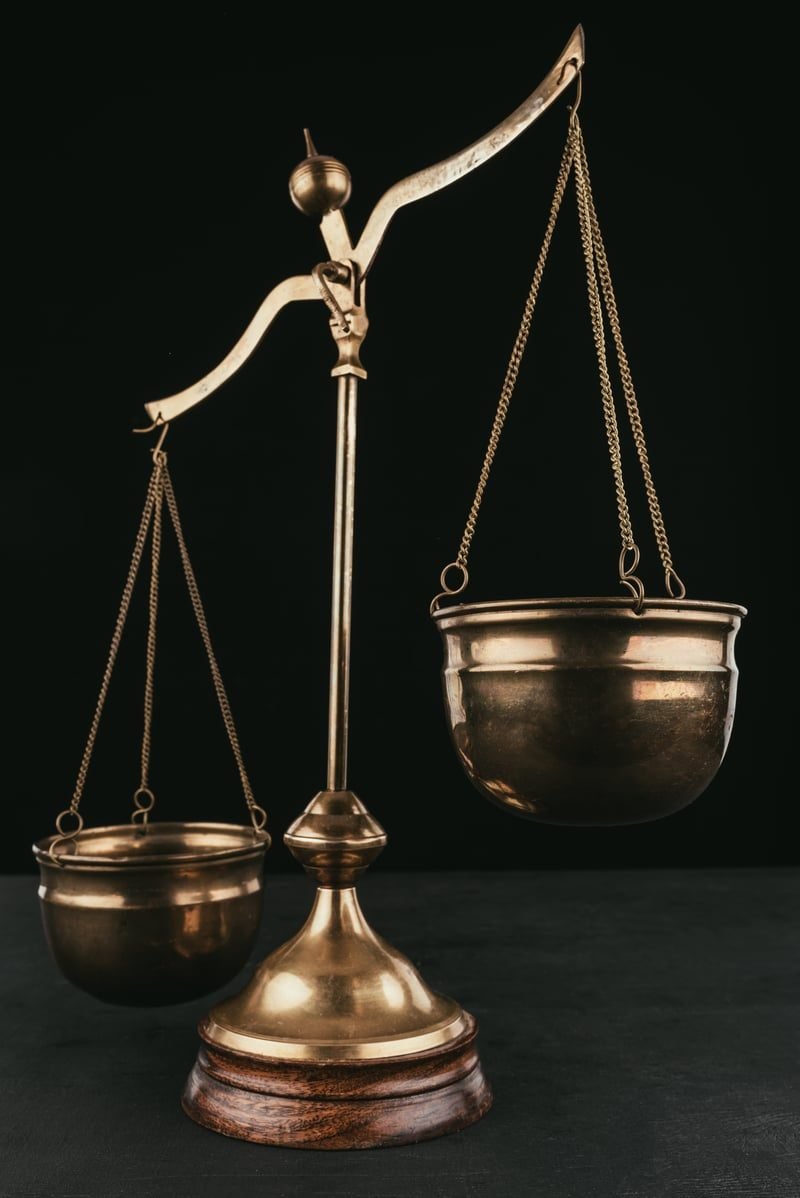 Tag-Along Rights in London: What Local Businesses Need to Know 5 Scales of justice representing enforcement of tag-along rights