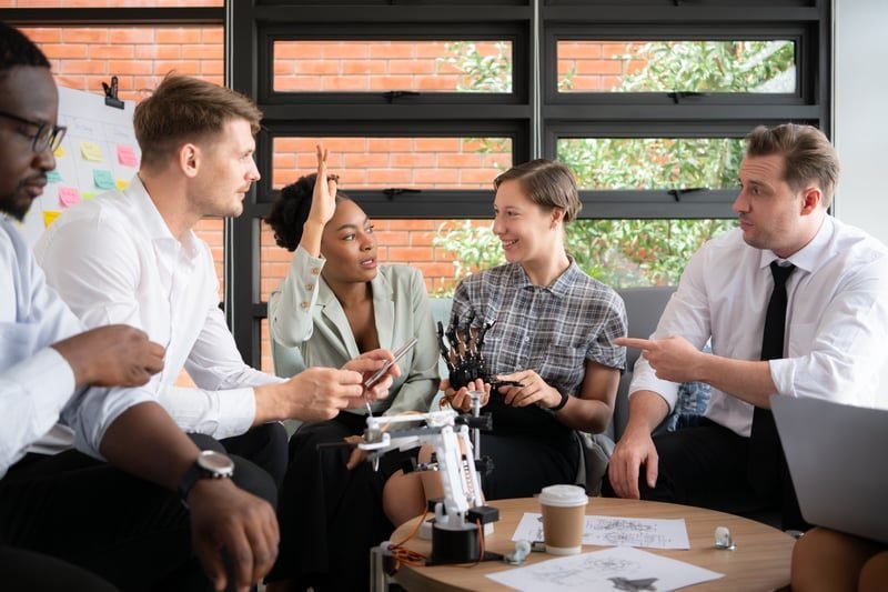 TUPE Transfers: A Complete UK Guide 1 Two business teams meeting during a TUPE transfer